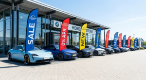 Automotive feather flags displayed on a car dealership lot