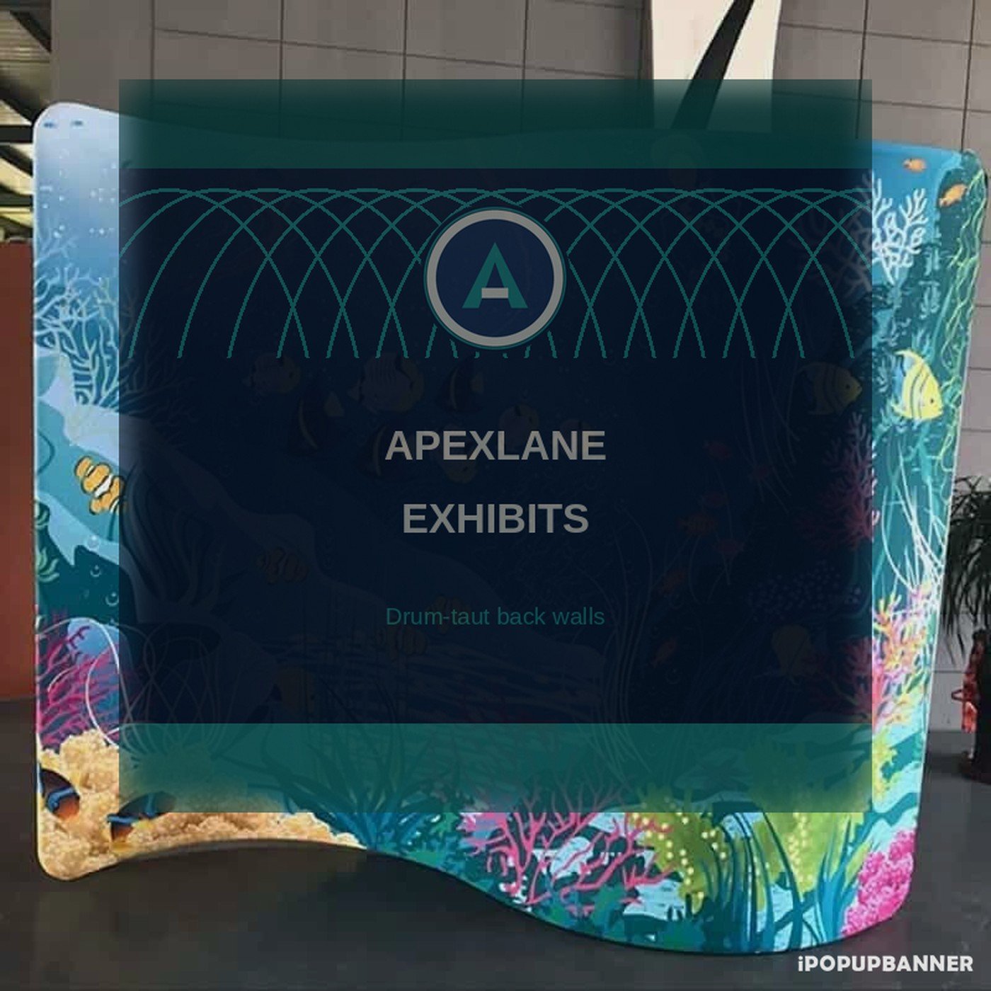 Curved wave tension fabric backdrop with Apexlane Exhibits invent branding drum-taut pillowcase on tube frame indoor showroom floor